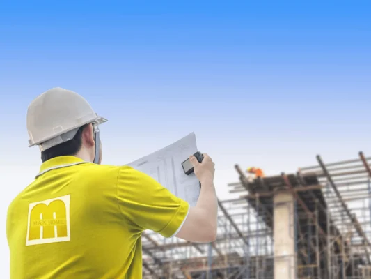 engineer is inspecting his work in building construction site